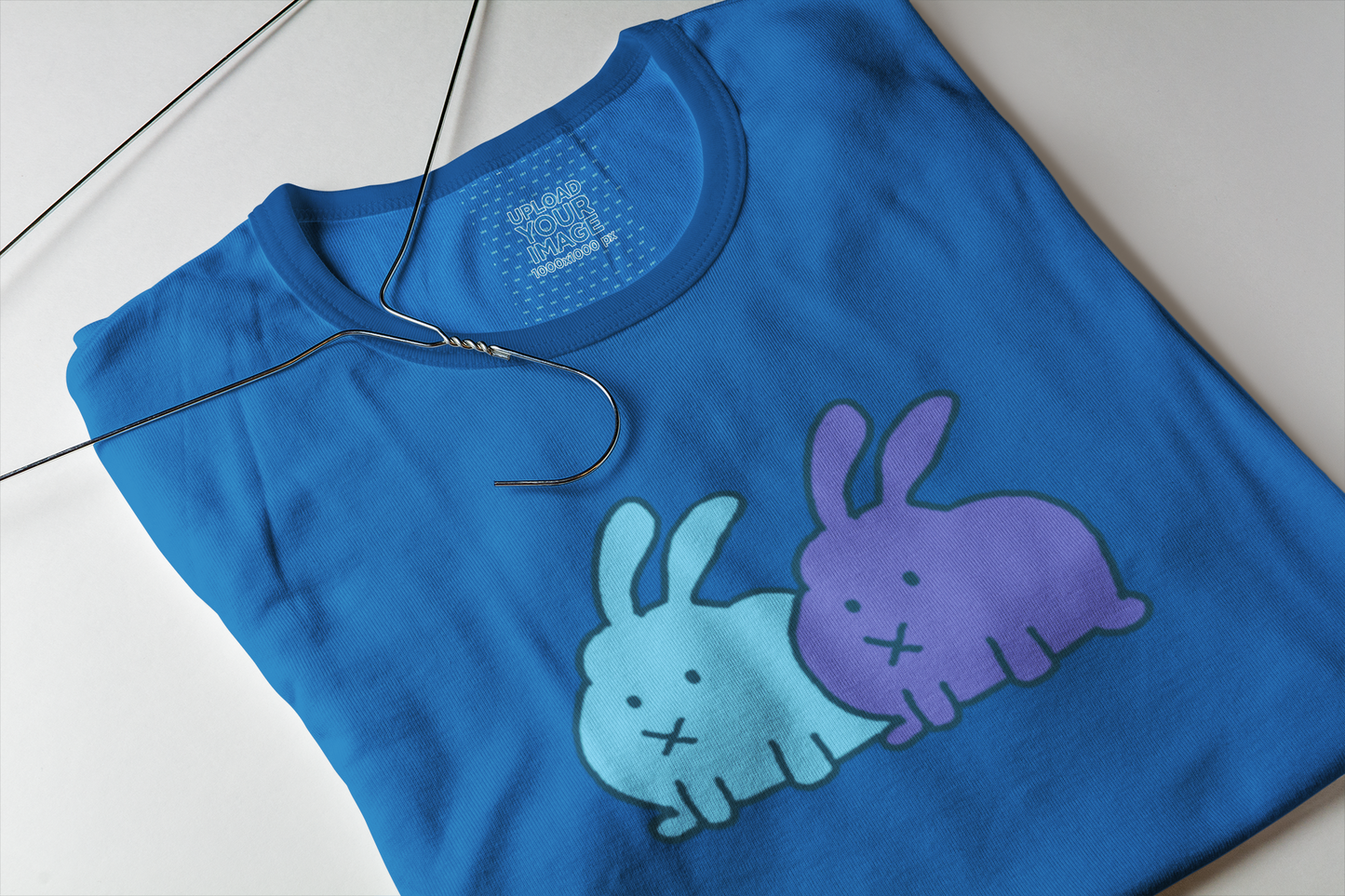 cute blue woman bunnies T-shirt, folded